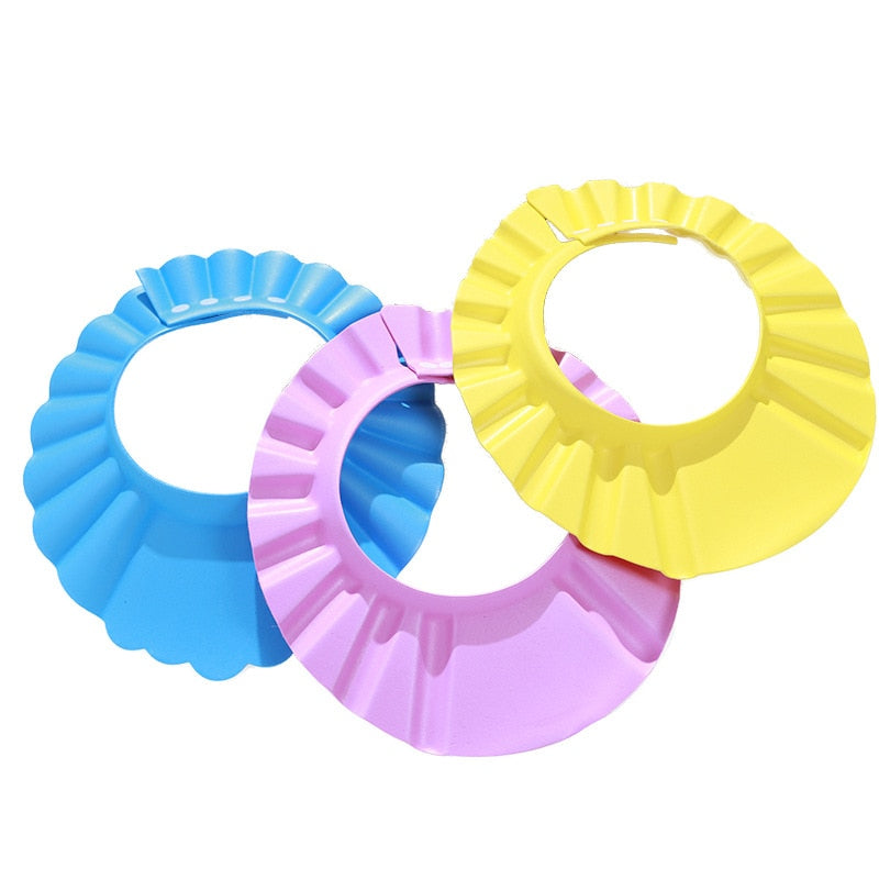 ShampooShower Bouclier de tête pour douche bébé.