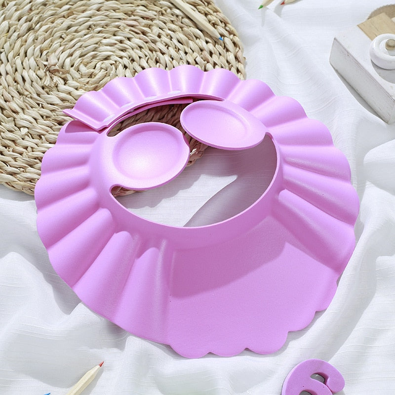 ShampooShower Bouclier de tête pour douche bébé.